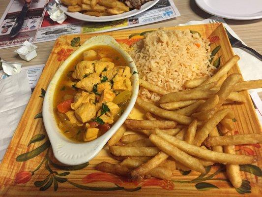 Chicken Mozambique with rice and French fries