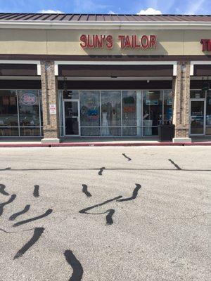 Small storefront to the left of Kroger and next to Jersey Mike's