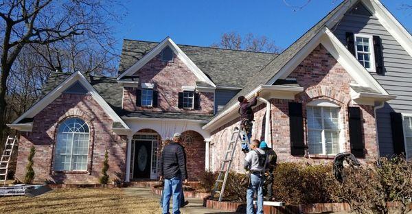 New roof, paint and siding repair.