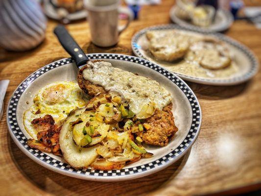 Chicken Fried Steak with biscuits and gravy.