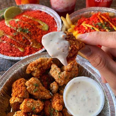 Popcorn chicken is made with crispy pieces of chicken tossed with our special salt and pepper seasoning.