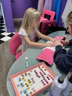 Nail painting and ring is included! My daughter loved it!