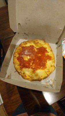 sauce dumped on top, missing from 1/3 of the pizza despite paying for extra sauce