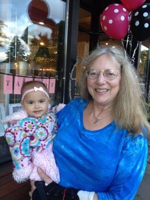 My grand daughter and I in front of Coco's after a fashion show.