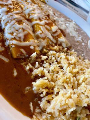 2. Two Enchiladas with Beans and Rice