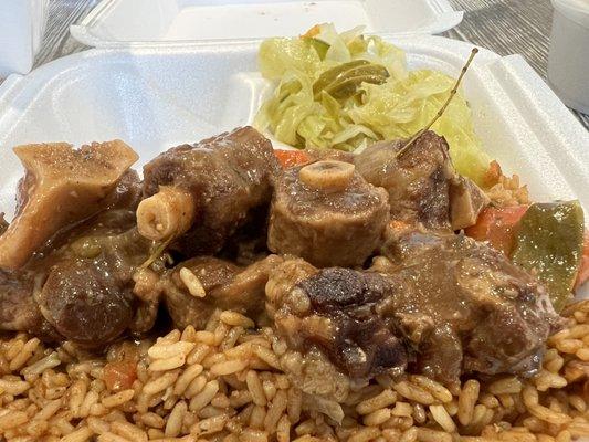 Oxtails, peas and rice, stewed cabbage