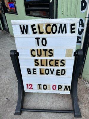 Welcome sign outside store