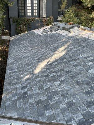 New slate tile roof ( 12000 sq ) special order tile from Italy. Hollywood hills