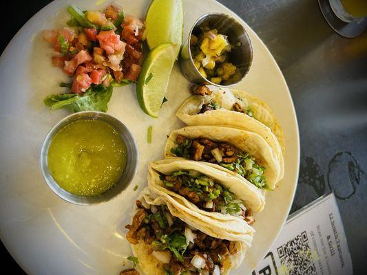 Tacos al pastor were pretty good, a little dry...