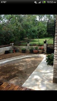 Custom rock patio designed by owner Esteban Sanchez