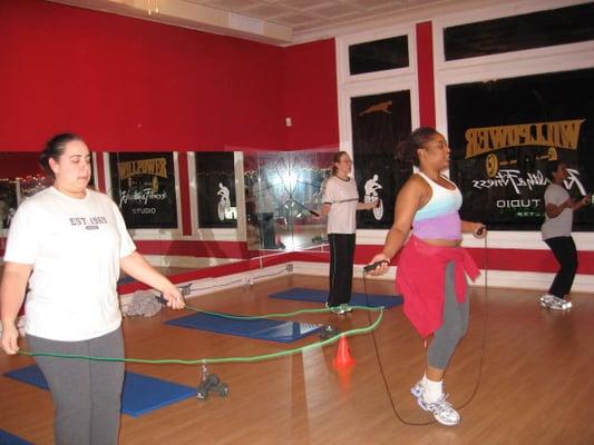 Indoor Boot Camp Class working Abs, legs, core, strength, agility and more 4 days a week.