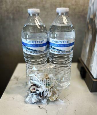 Complimentary waters and a welcome bag of salt water taffy - nice touch!