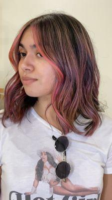 Pink hair color and haircut