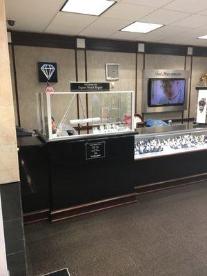 Rafael at the watch repair station at Kirkland Fred Meyer Jewelers.