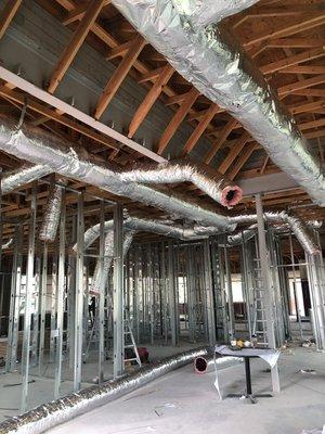 Finishing up the ductwork on a commercial build out.