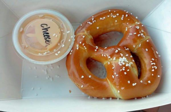 new $1.99 pretzel..compare size to dip container, it is small & sauce sucks