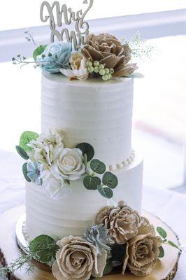 Custom wedding cake Vanilla with Raspberry Cake on bottom tier and Red Velvet Cake on the top tier