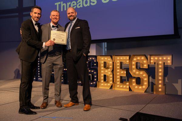 Rollin Hansen and Kevin Hawk, our founders, receiving the Best Property Management company awards in the state of Idaho.