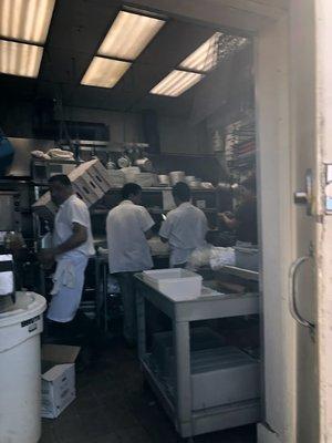 kitchen  crew working hard