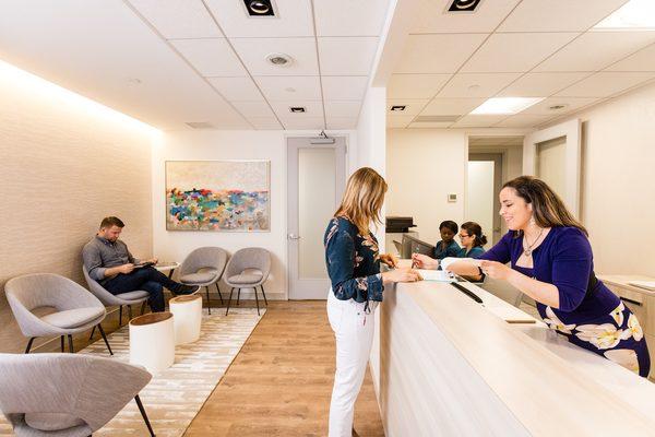 Greeting a patient in the entrance of Pelvic Rehabilitation Medicine