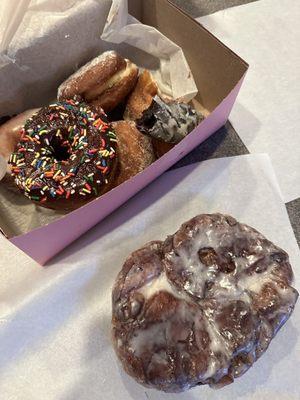 Apple fritter and a mix of donuts.