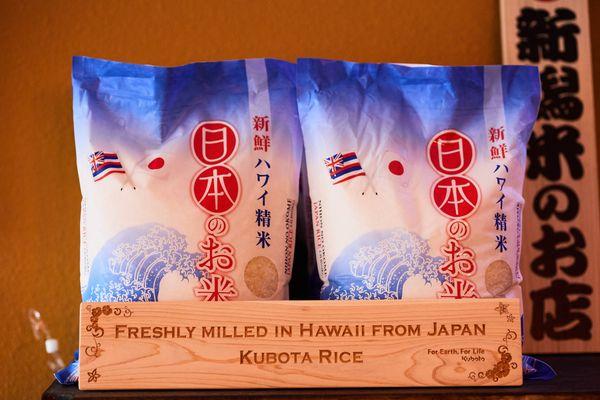 Serving fresh milled rice grown in Japan 100%