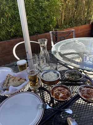 Rice, garlic naan, saag paneer, tikka masala, and butter chicken. All delicious!