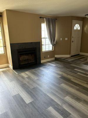 New floor and fireplace slate. We love it!