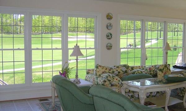 reduce glare from the sun and enjoy your living room more with tinted window glass