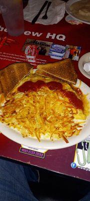 Western omelet with hash browns, wheel toast and salsa.