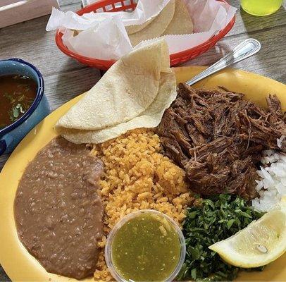 Birria, rice, beans, tortillas