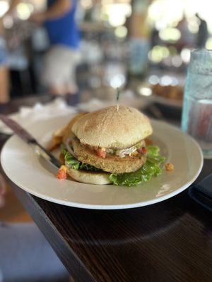 Local Taro burger with herb oil, lettuce, tomato, red onion, pineapple pico de gallo, toasted ciabatta bun.