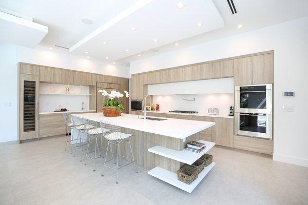 A Smashing Modern Home in CoconutGrove. Grey Bardolino Oak, White Quartz Counters & Subzero Appliances. Amazing!