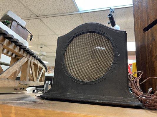 Very cool antique radio, next to their train tracks!