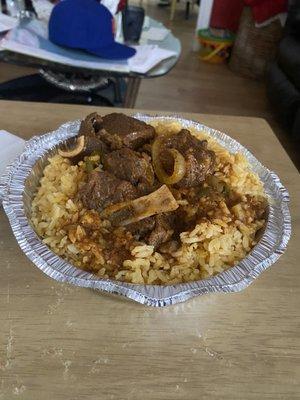 Goat with yellow rice