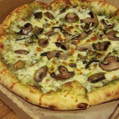 Mushrooms and Pesto Pizza! Greasy and a whole lot of crust.