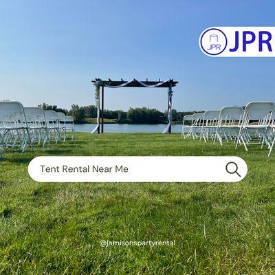 White Wedding Chair Setup With Pergola On Lake