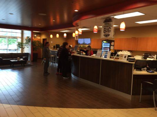 The beautifully decorated front desk area. Feels more like a hotel lobby.  Healthy shakes and snacks available.