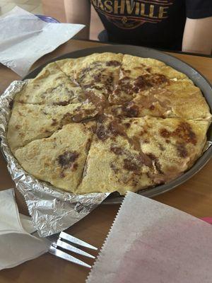 14" pupusa. It's the size of a large pizza