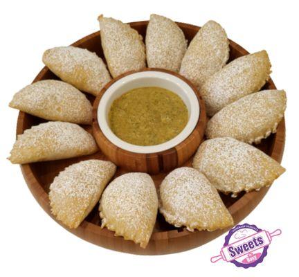 EMPANADAS PERUANAS , baked filled with beef, chicken, spinach or salchicha Huachana