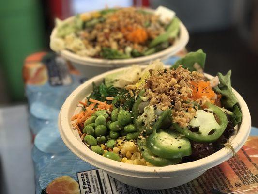 Two bowls of two-scoop protein bowls with all the toppings