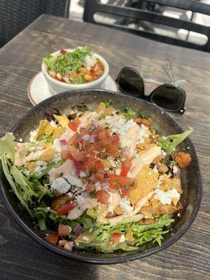 Salad with fish and soup with hominy