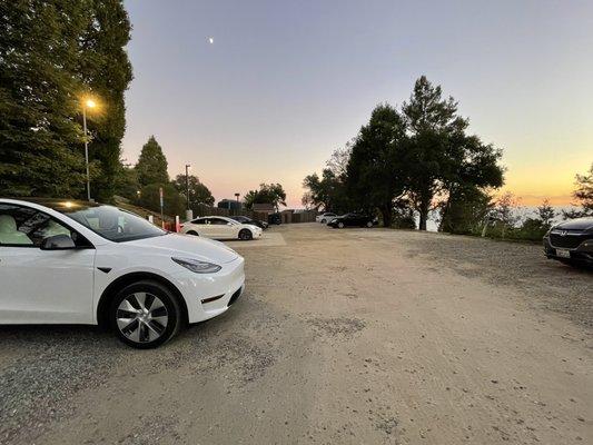 Charging area on the left side, general parking on the right