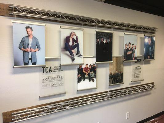 Architectural display using interchangeable photos.