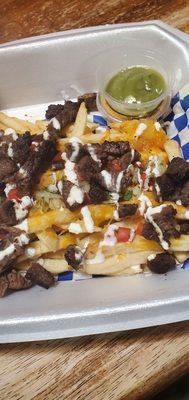 Steak fries with sauces on the side