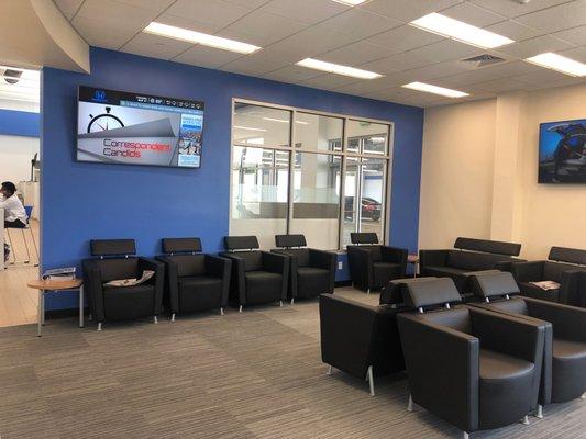 Service Waiting Area equipped with plush chairs and Three 60-inch TVs. We also offer free WiFi