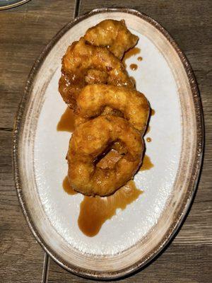 Picarones(Peruvian Donuts made with squash, sweet potato, and drizzled with chancaca sauce-sugar melted)