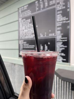 Hibiscus tea with two pumps of simple syrup