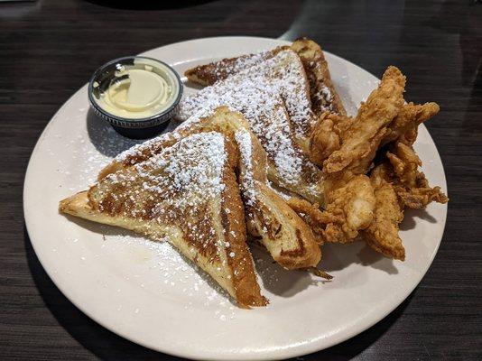 French toast with a side of fried chicken tenders