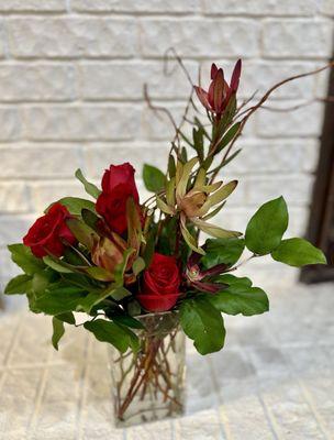 Rose and protea arrangement